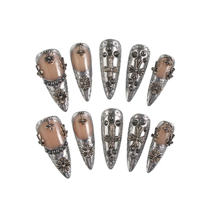 Chrome Reign stiletto press-on nails set in metallic chrome silver, salon-quality reusable nails with 3D accents on a white background