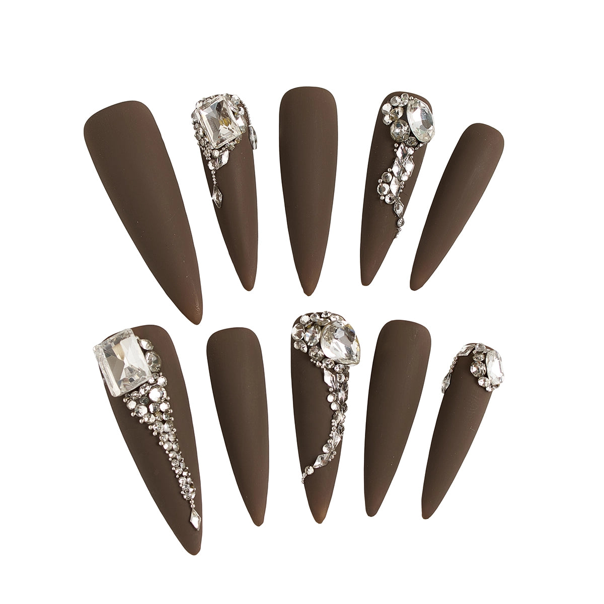 Set of long stiletto matte brown nails with rhinestone and crystal embellishments, displayed on a white background.