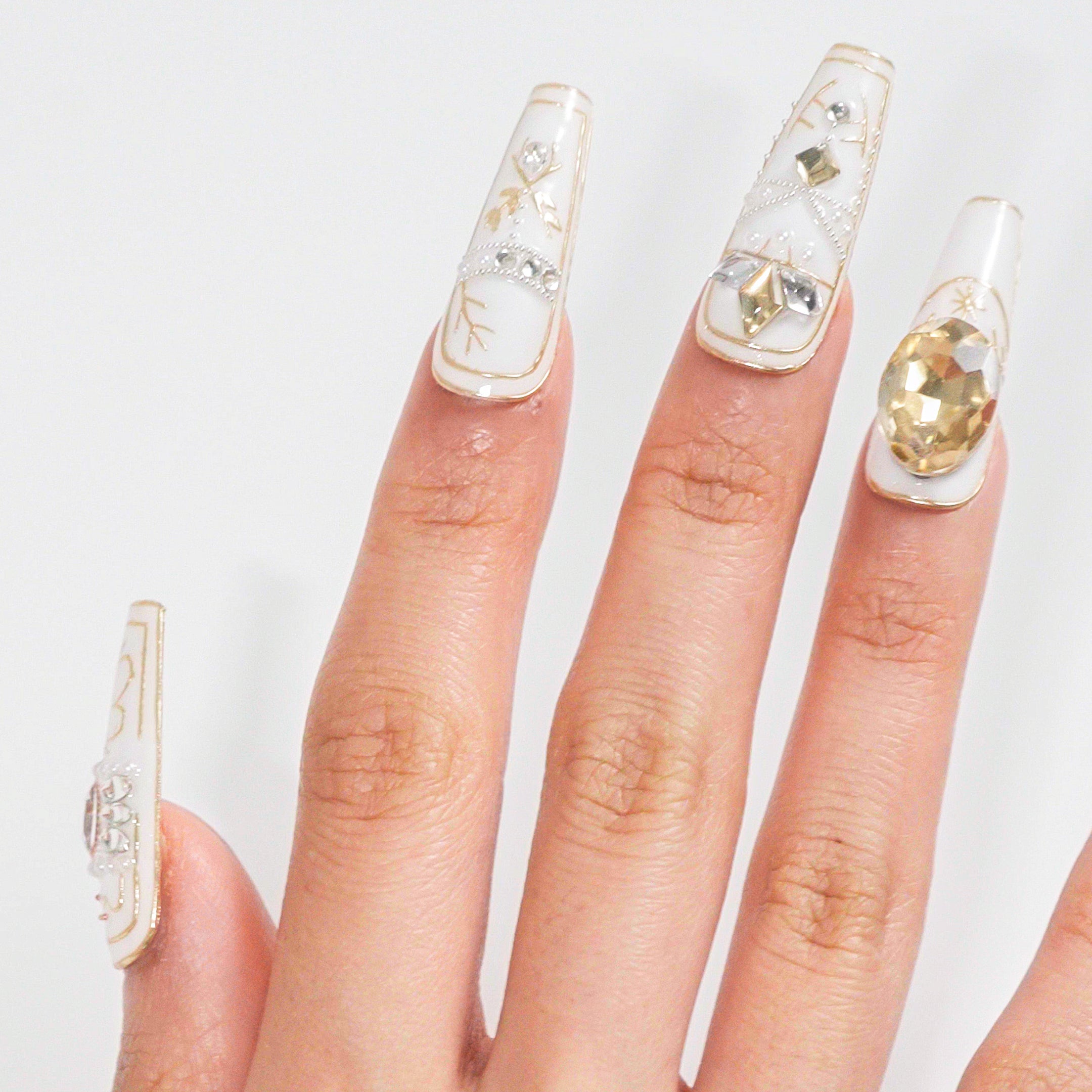 Close-up of a hand fully finished with MiuNail press-on nails, showcasing the completed application after setting and shining.