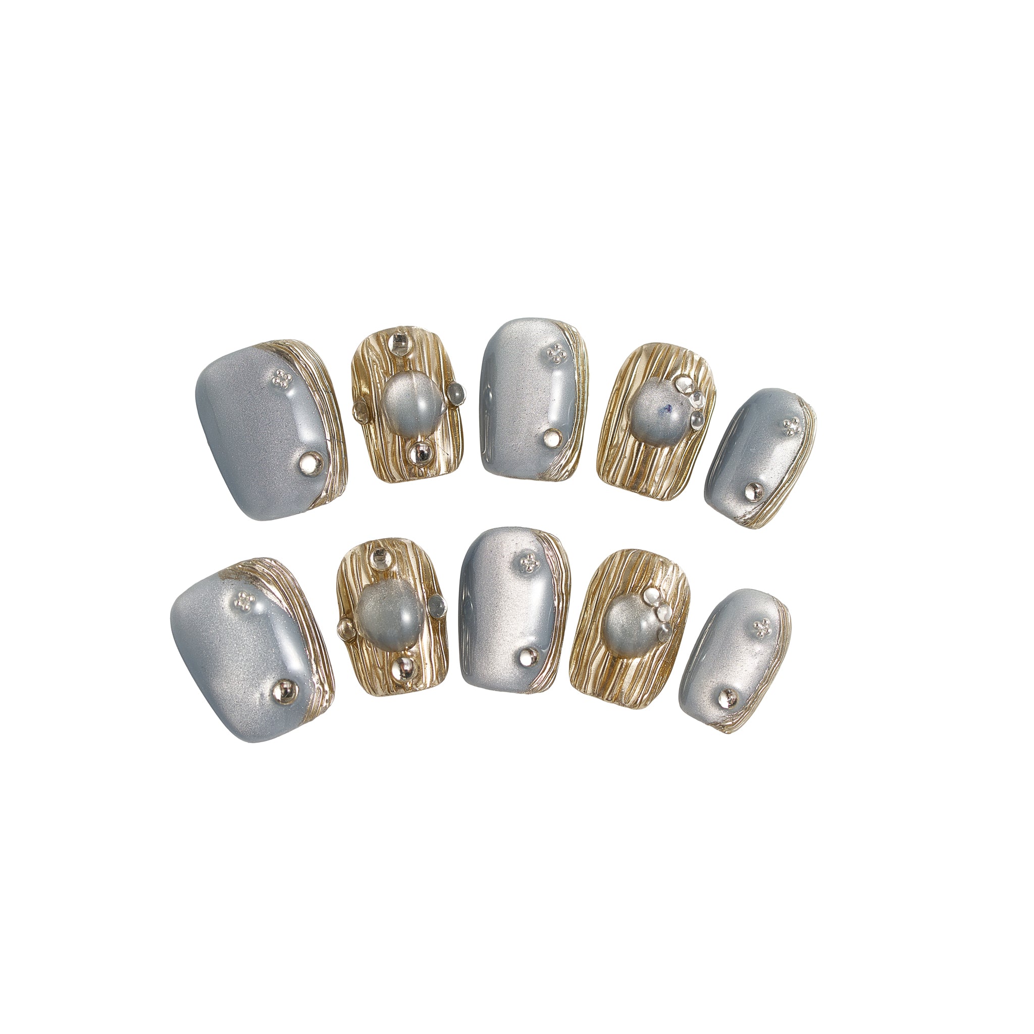 MiuNail Mist Orbit metallic press-on toe nails with silver and gold accents, arranged on a clean white background.