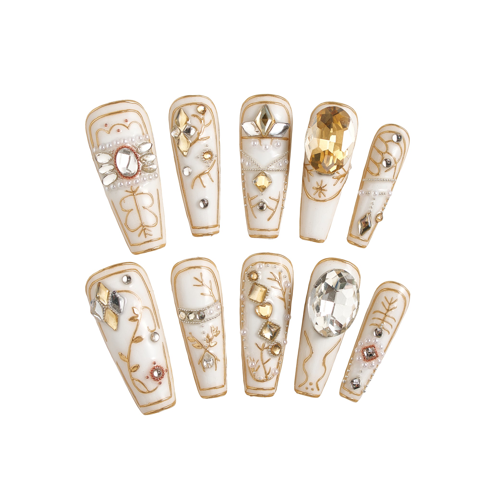 Flat lay of MiuNail Ornate Veil press-on nails in glossy white with gold line art and crystal embellishments, arranged on a white background.